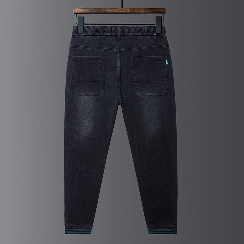 Tallas grandes de los hombres de Otoño de estiramiento de los pantalones vaqueros flacos flojos gordos del todo-fósforo de la cintura elástica de moda