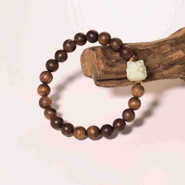 Pulsera de estilo nacional de pera negra, nueva pulsera china de madera de ébano, rosario de Wenwan, pareja de hombres y mujeres, pulsera de danza del león retro