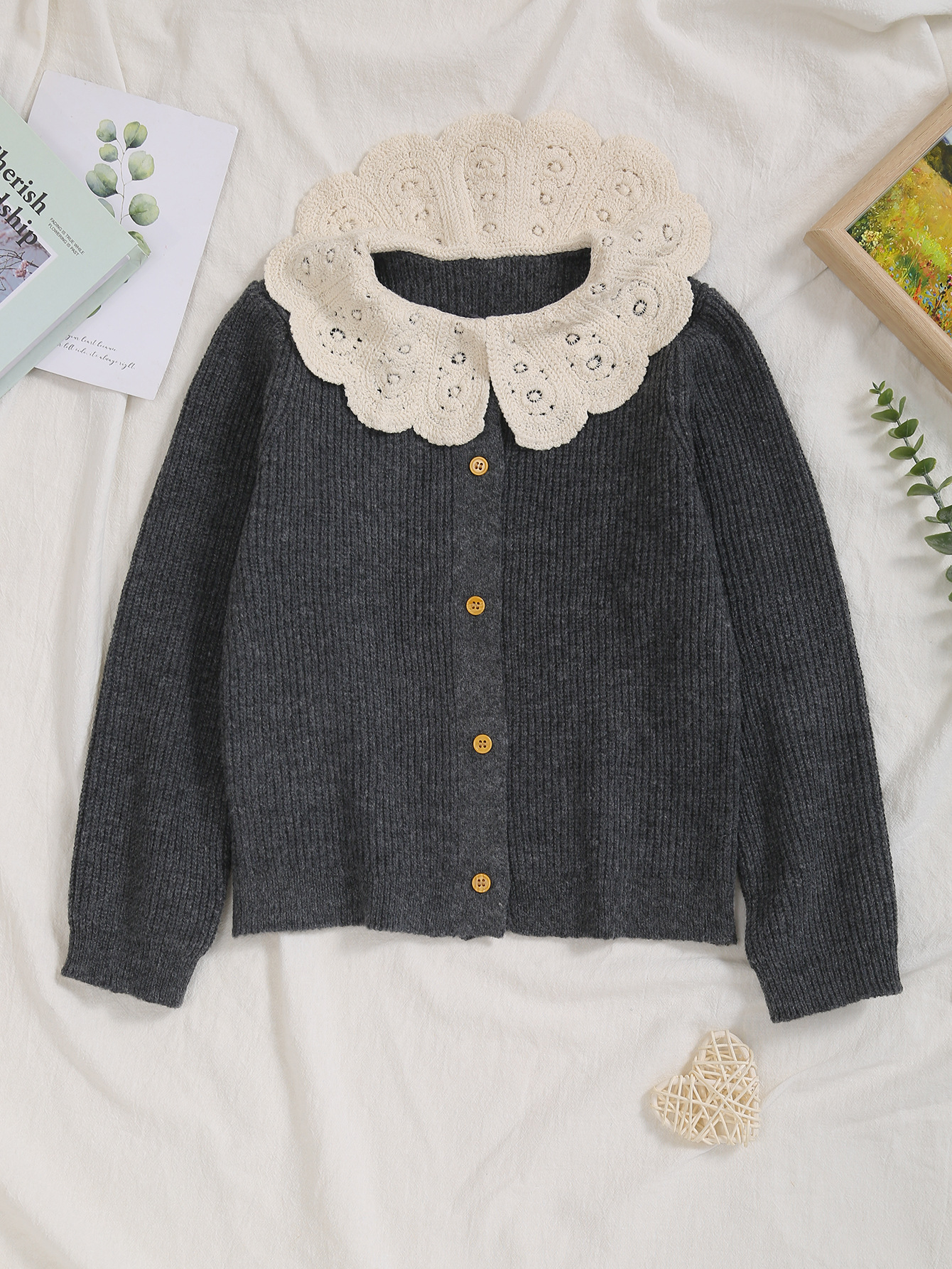 Knitted cardigan, with embroidery