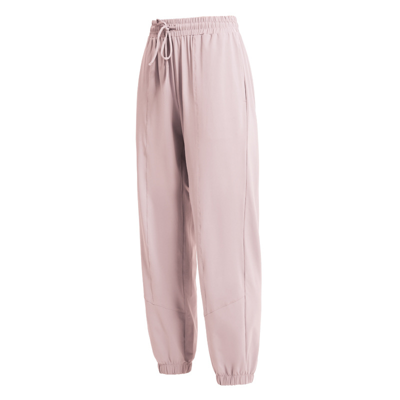 Pantalones deportivos europeos y americanos pantalones largos de protección solar para mujeres con cordón para adelgazar polainas sueltas Otoño e Invierno nuevos deportes más pantalones de Yoga de tamaño