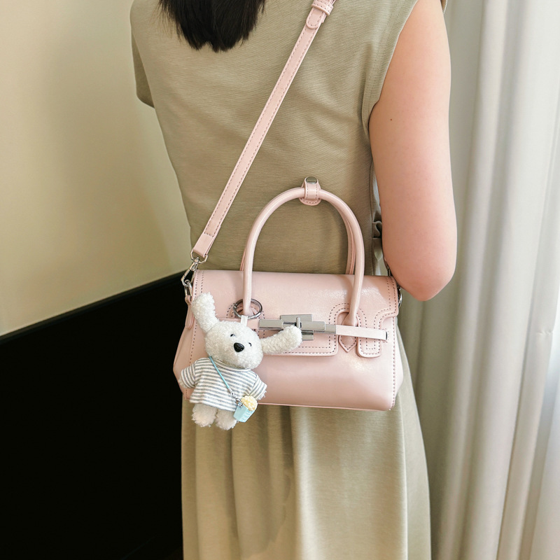 Bolso cuadrado pequeño exquisito, bolso de mano simple, 2026 nuevo tipo de tela, bolso de hombro de mujer, sensación diaria, bolso de hombro universal