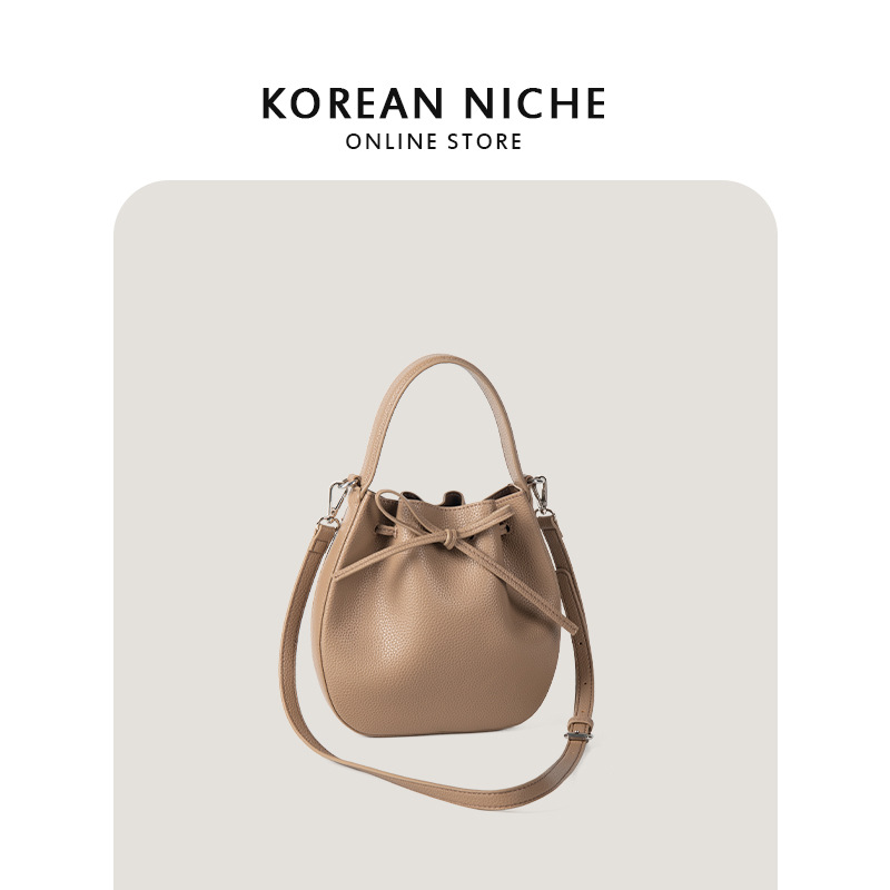 2024 nuova versione coreana borsa a tracolla in morbida pelle con motivo litchi, borsa a secchiello con fiocco e coulisse_voghion.com