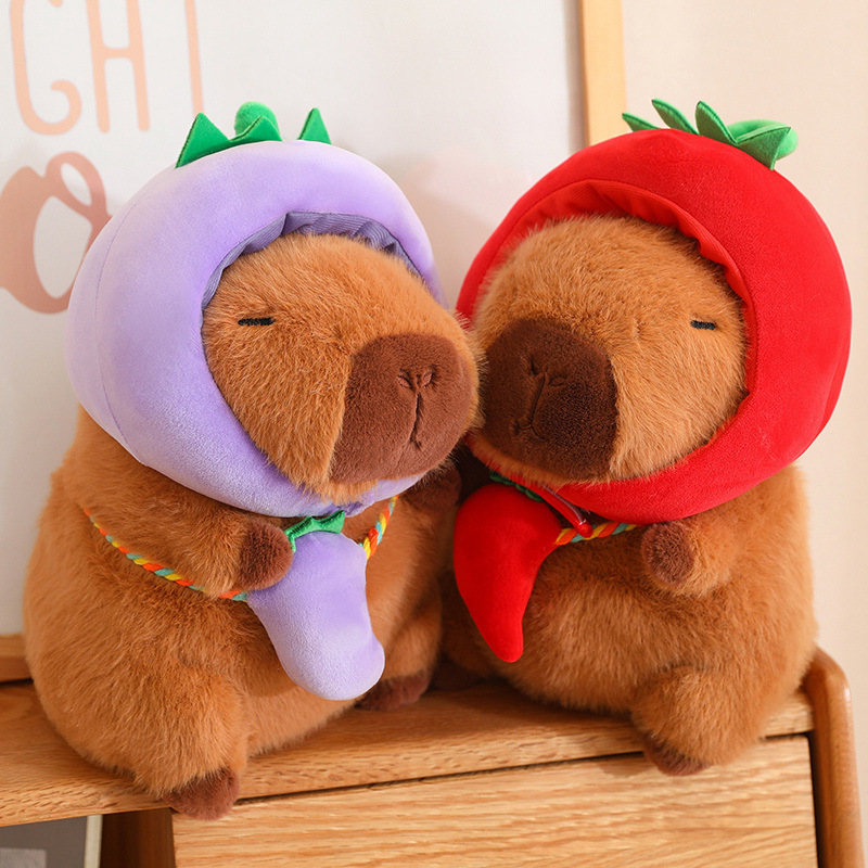 Nuevos juguetes de peluche vegetal capibara transformar cabeza delfines muñeca chirriante muñeca atrapar máquina adorable lote