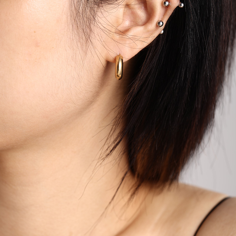 Joyas Xuping pendientes de acero inoxidable nicho de alta calidad pendientes personalidad europea y americana simple y fría pendientes en forma de C para mujeres