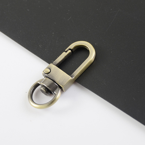 Manufacturer wholesale puppy buckle spring keychain creative gift luggage buckle hardware accessories gift bag hook buckle