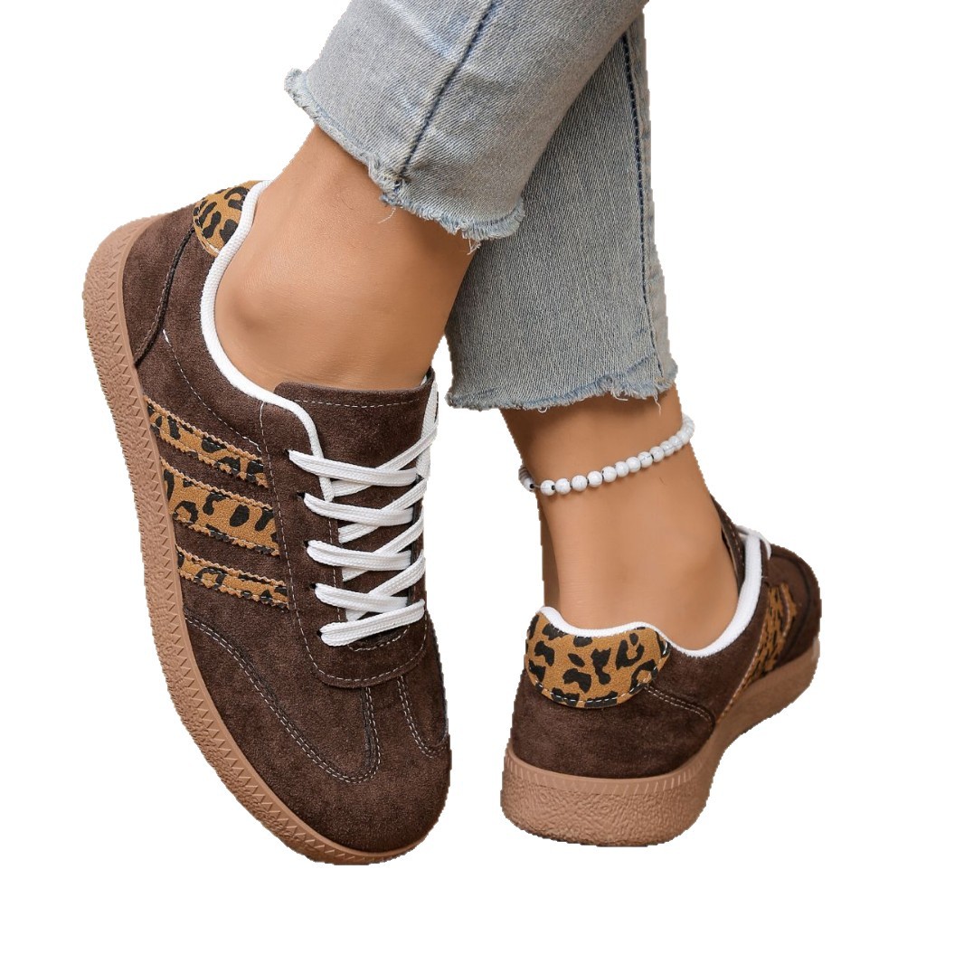 Comercio exterior transfronterizo retro zapatos de entrenamiento de mujeres nuevos lazos de cabeza redonda de color leopardo estampado zapatos casuales de skate plano grande por mayor