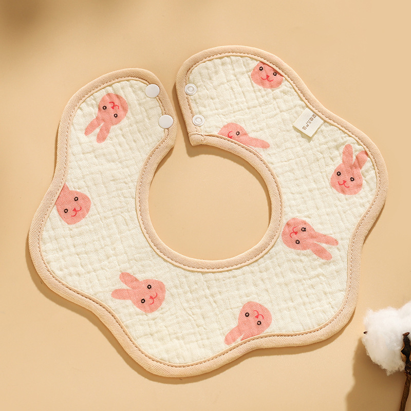 Tête de lapin rose (bavoir imperméable pétale)