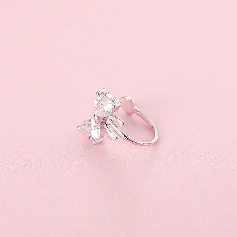 S orecchini in argento puro versione coreana con clip senza foro per l'orecchio e fiocco a farfalla intarsiato con zirconi_voghion.com