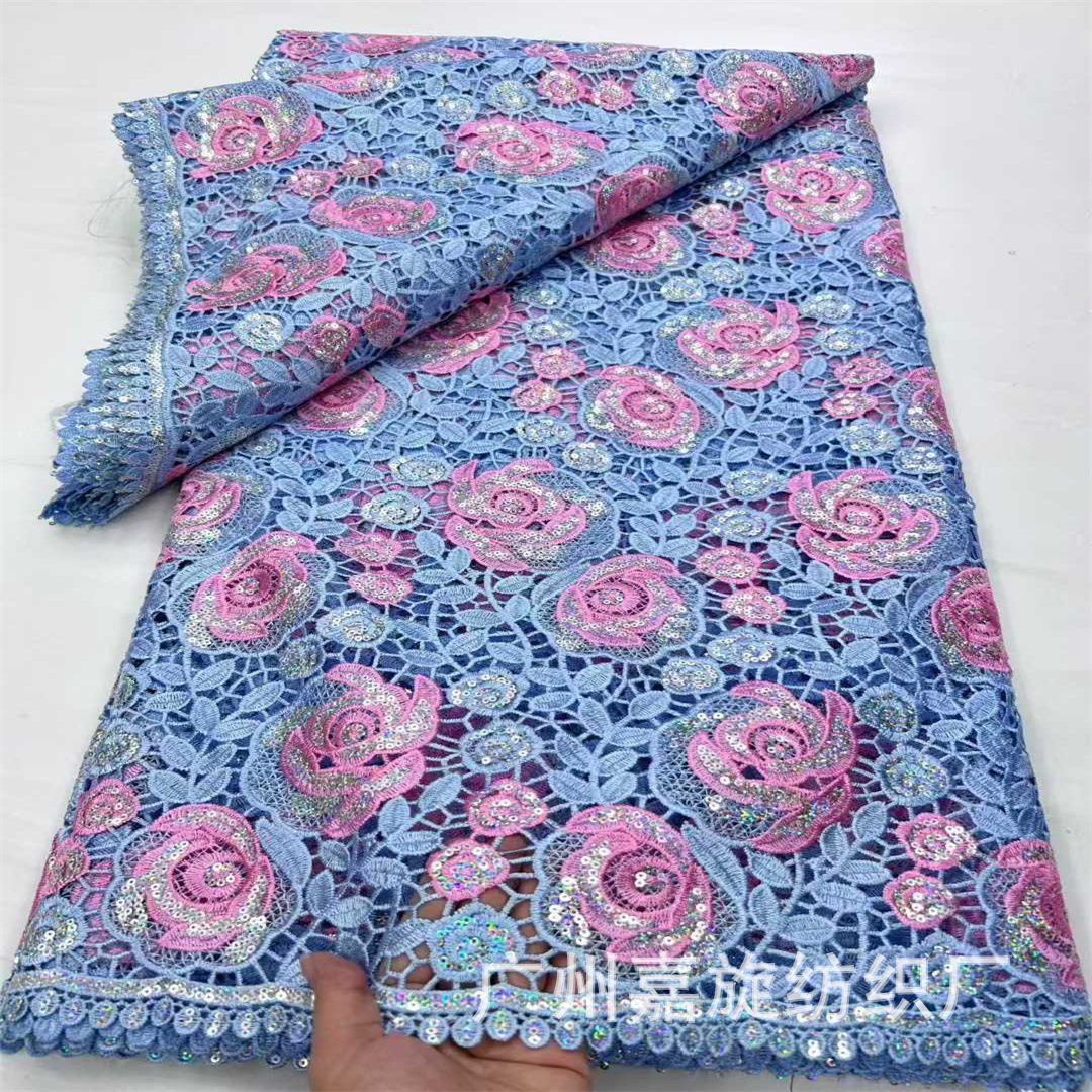 Tela de encaje africana con bordado láser de rosas huecas soluble en agua, en stock, para vestidos de moda.