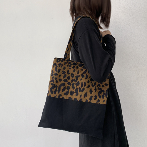 Autumn and winter new leopard print canvas bag women's single shoulder large capacity literary design ins tote bag student class bag