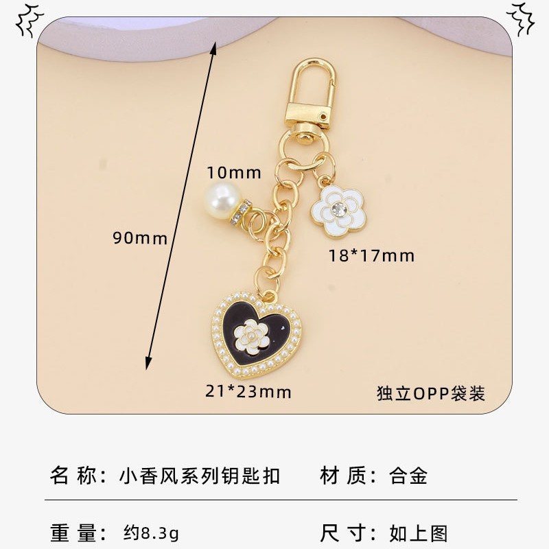 Xiaoxiangfeng ハイヒール口紅パールキーホルダー女性学生バッグペンダント DIY ヘッドフォン保護カバー装飾|undefined