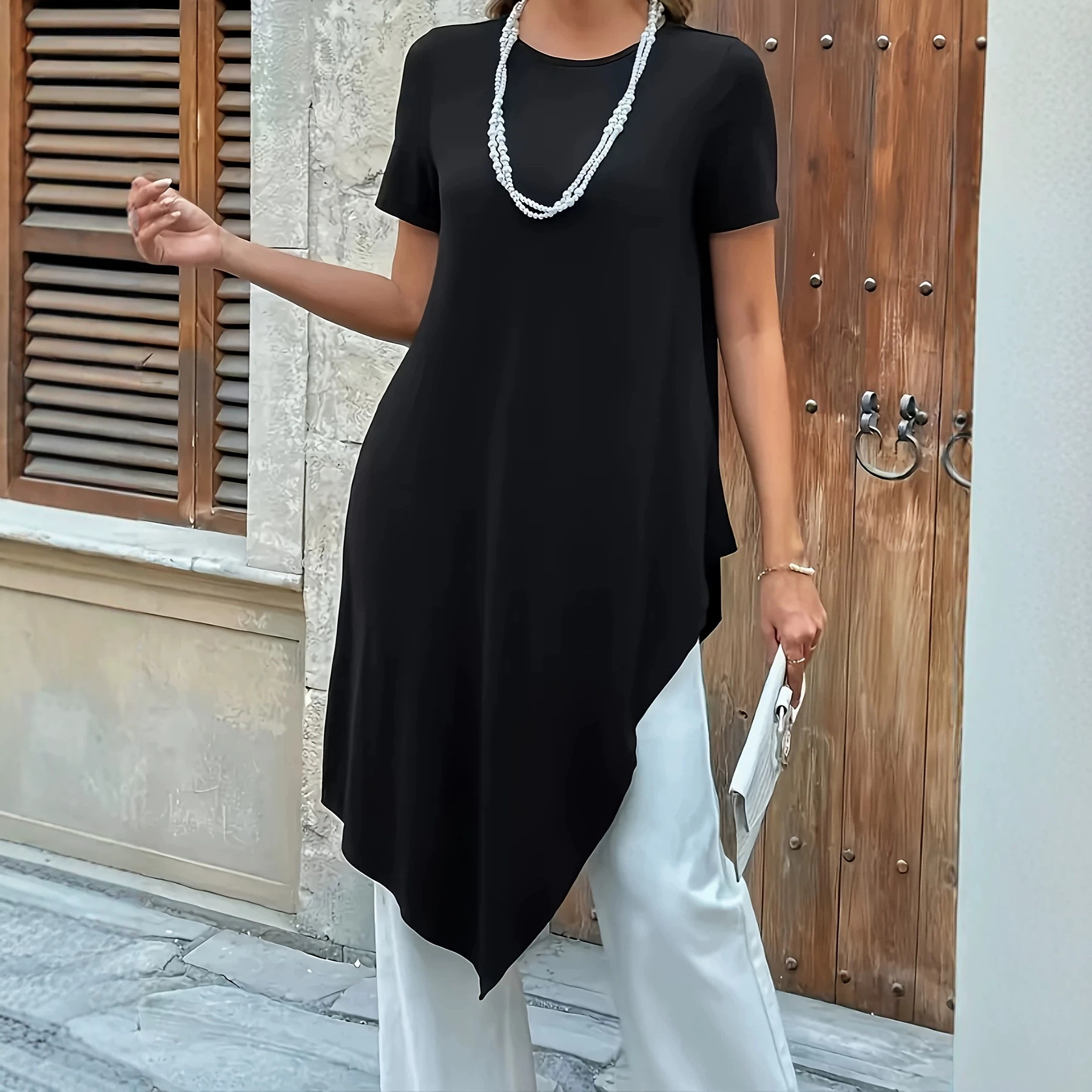 New European and American style women's plus-size long skirt in solid color with an irregular hem, paired with a round-neck short-sleeve top