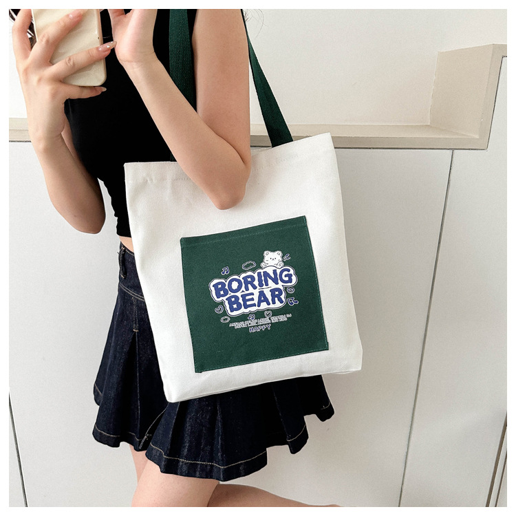 Wholesale of 2025 new casual and fashionable canvas bags, large-capacity single-shoulder bags for college students' shopping, and trendy tote bags undefined