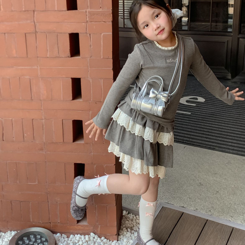 Bolso cilíndrico para niña de color sólido simple bolso de bebé con lazo dulce y lindo 2025 moda mini bolso para niños