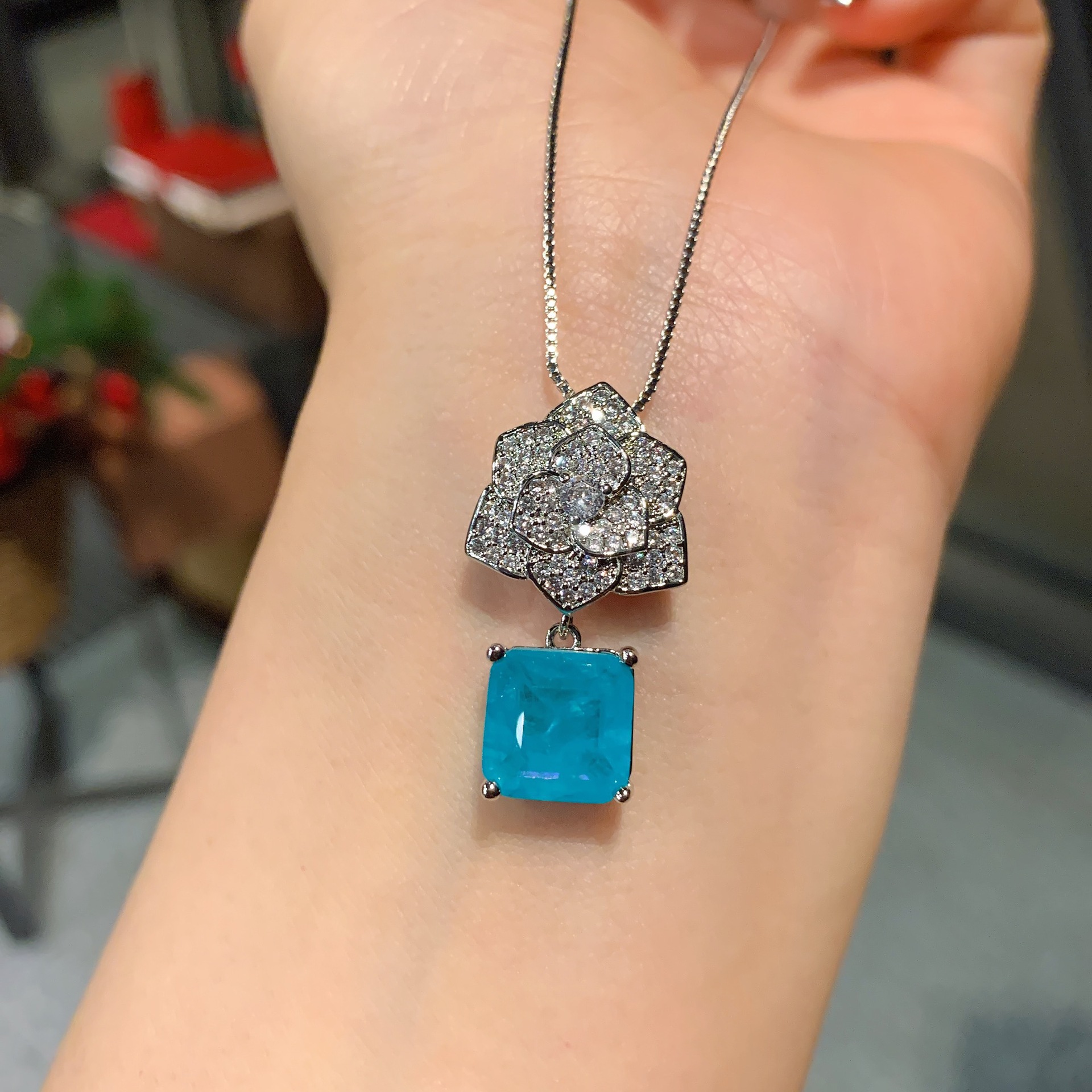 Zhuang Sheng joyería europea y americana simulación palaiba anillo collar pendientes traje en forma de flor creativa diamante completo 10*10