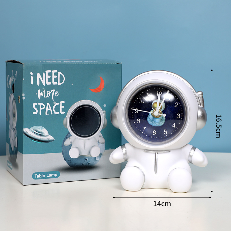 Astronaut, watch, white posture corrector, piggy bank