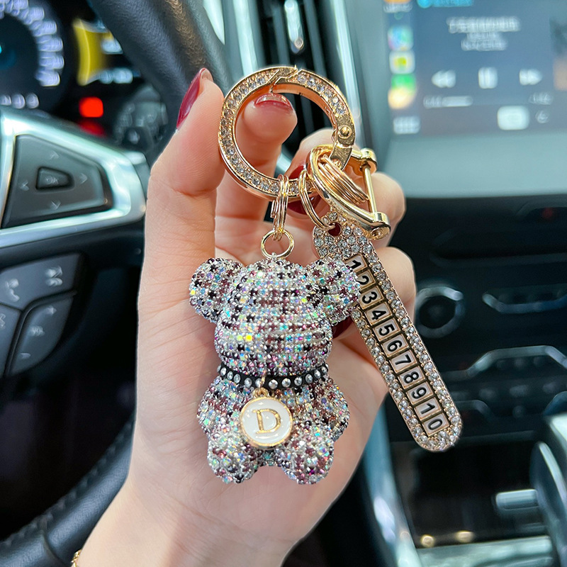 Collar de dibujos animados creativo letras llenas de diamantes placa de número de oso llavero de automóvil anti-perdida llavero regalos para hombres y mujeres