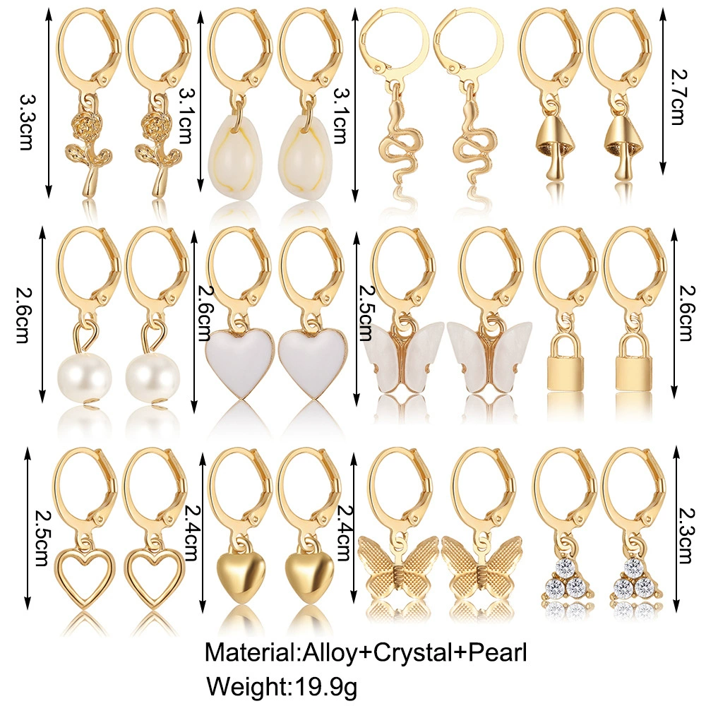 Pearl earrings set, gold‑tone multi‑pair on display card, assorted charm styles