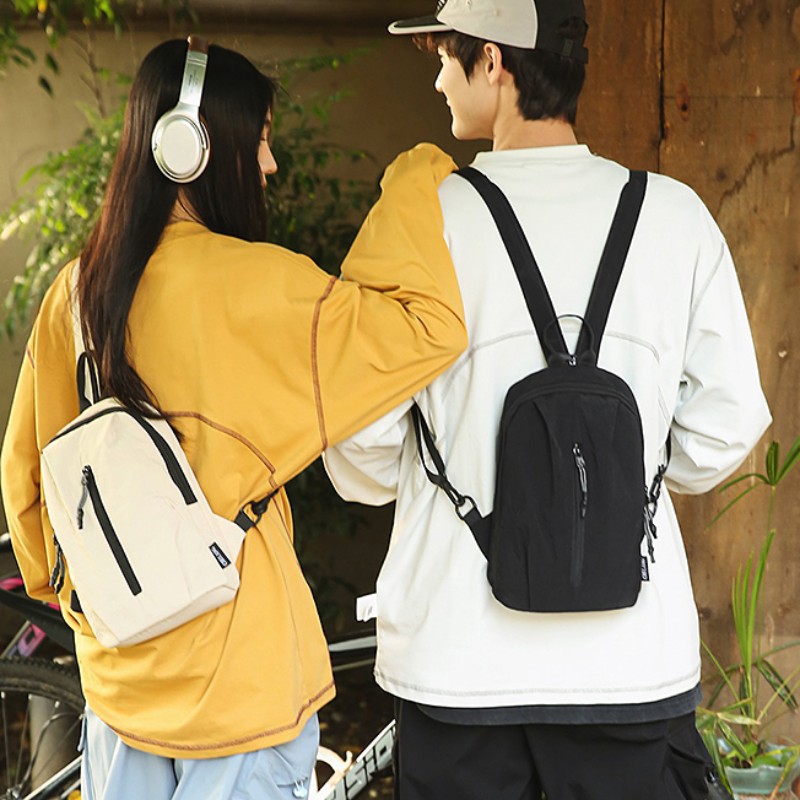 Nuevo estilo pequeño y fresco bolso de mensajero de pareja para hombres y mujeres, mochila de moda simple, mochila de ocio al aire libre de ciclismo multifuncional