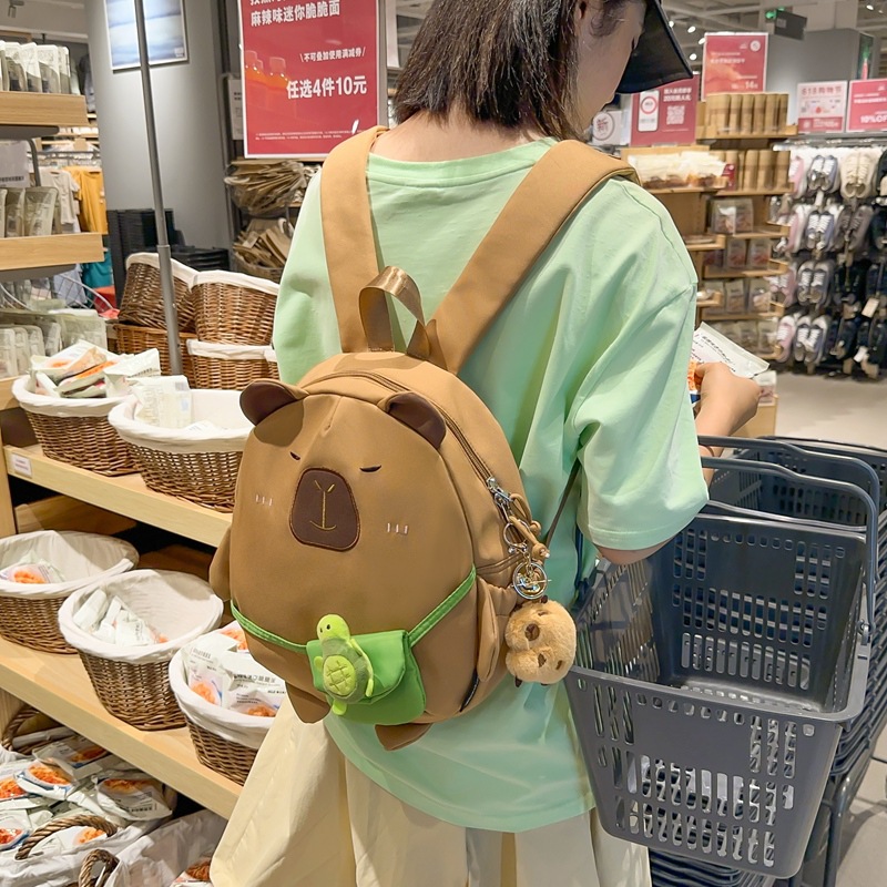 Mochila japonesa encantadora de dibujos animados 2024 nueva extraña mochila de muñeca de gran capacidad de muñeca de estudiantes