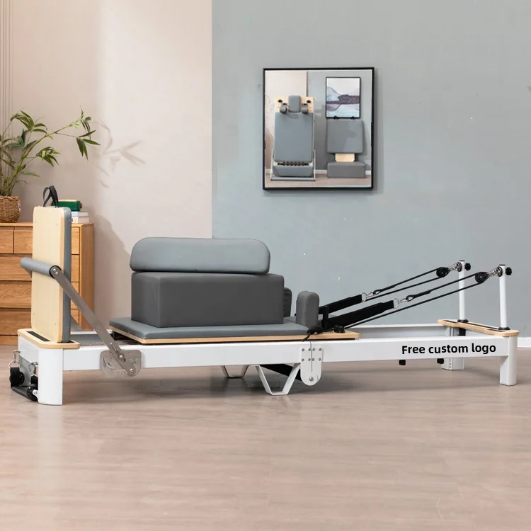 Fábrica Pilates cama central plegable yoga gimnasio de belleza dispositivo de moldeo doméstico de roble de aluminio pequeña cama blanca