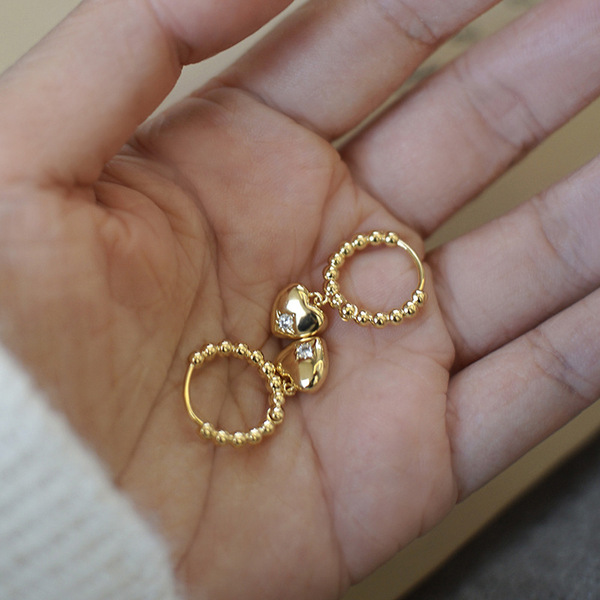 Golden small design elegant earrings