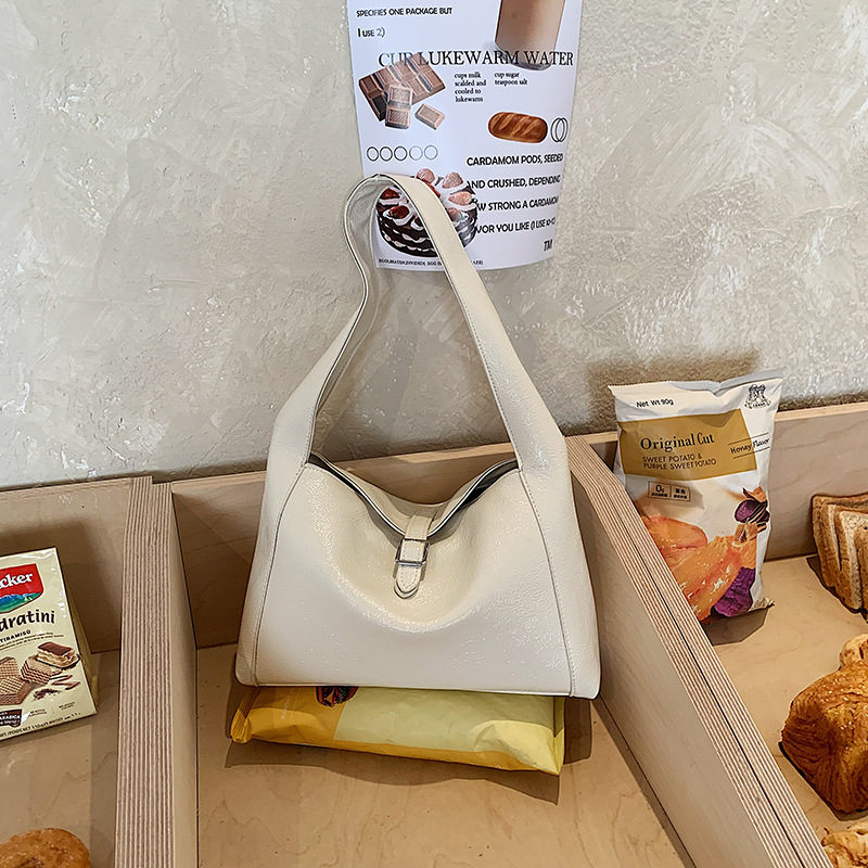 Nicho de diseño sensación de cuero suave bolso debajo de la axila mujer 2026 textura de moda gran capacidad bolso de hombro bolso de mano