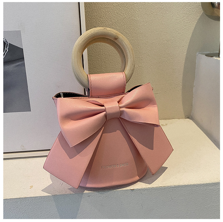 455g Weight Synthetic Leather Lining Material Sewing Thread Fashion Element Magnetic Buckle Closure Type Single Shoulder Strap, Double Handle Strap Type Bucket Bag Bags Type Casual Occasion Pu Leather Material Bow Knot Pattern All Seasons Season Women's Gender Elegant Style Bucket Shape Small Size Women's Small Pu Leather Bow Knot Elegant Sewing Thread Bucket Magnetic Buckle Bucket Bag 40