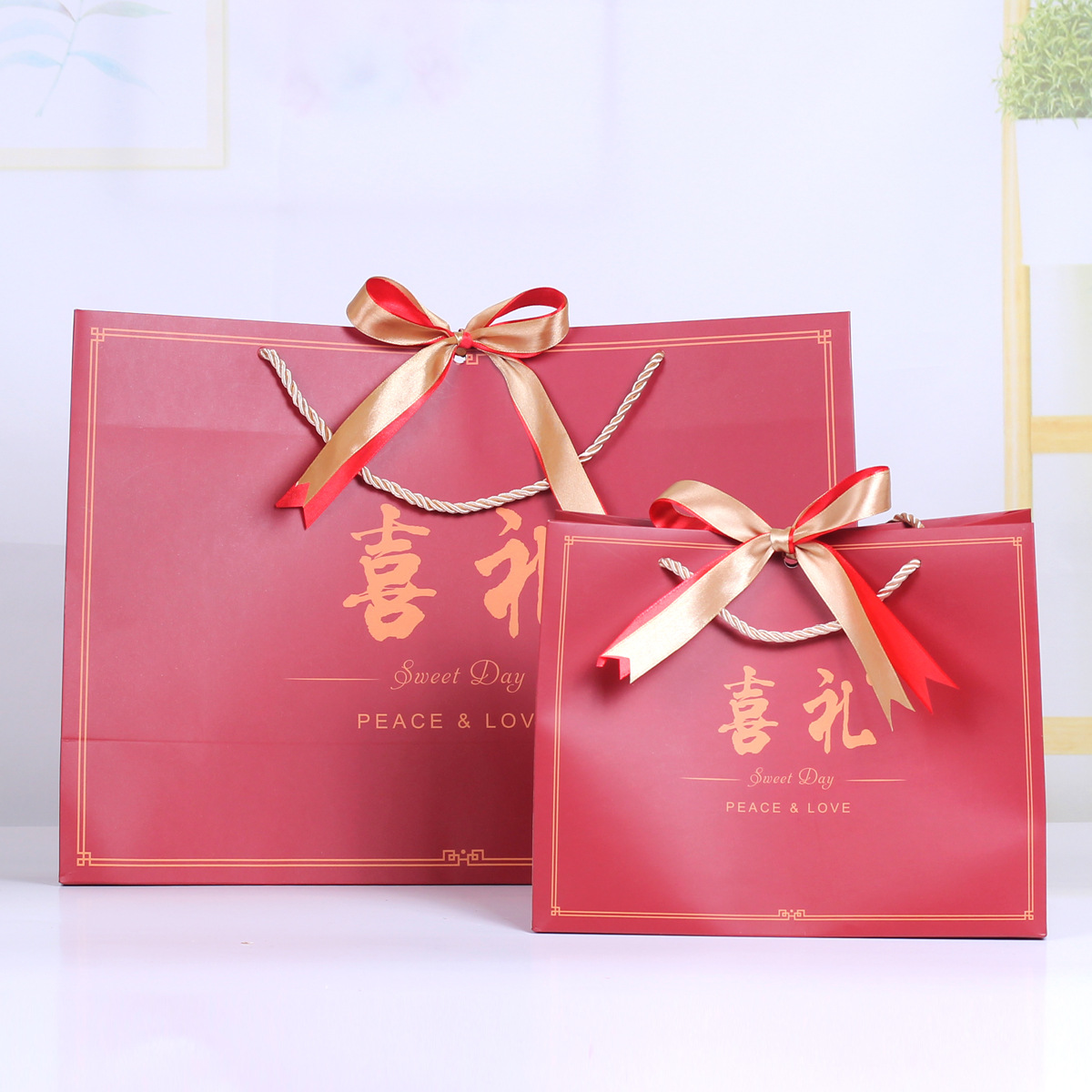 厂家直销新款蝴蝶结手提袋大红色结婚回礼纸袋子礼物袋ins高颜值