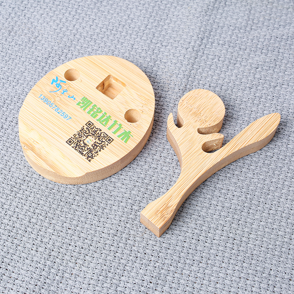 Nuevo soporte de teléfono móvil de bambú multi-funcional creativo escritorio teléfono móvil base perezoso Elk Horn modelado publicidad regalo
