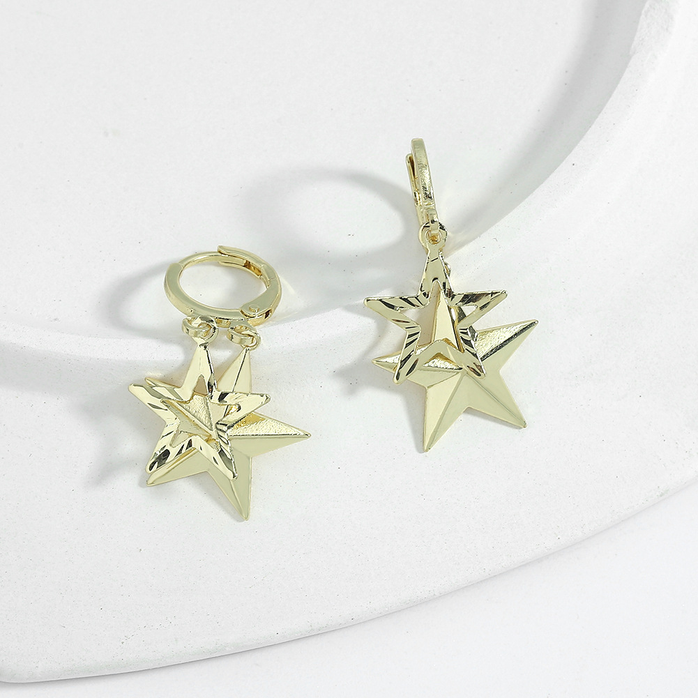 Korean Three-dimensional Eight-pointed Star Copper Earrings Wholesale Nihaojewelry display picture 9