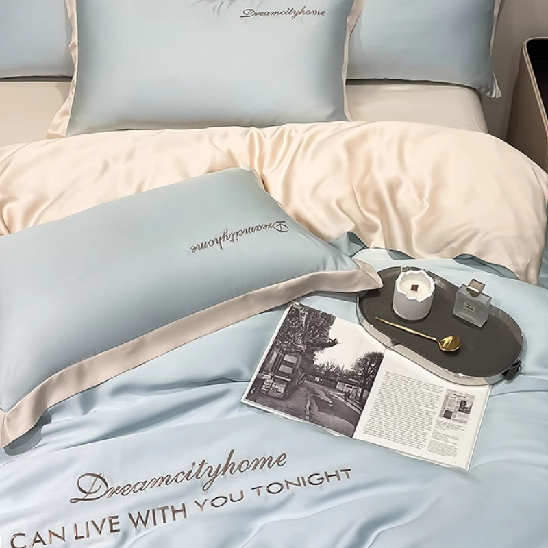 Juego de cuatro piezas de seda de hielo de alta calidad, cama de seda de lujo ligera, funda de edredón para dormir desnuda, sábana de tres piezas de primavera y verano