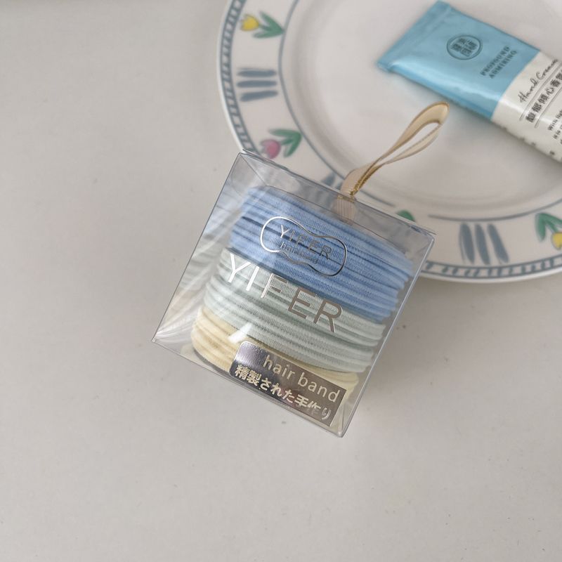 Niños cuerdas de cabeza de cola de caballo alta simple y durable anillo de cabello de alta elasticidad sin costura correa de cabello de niña linda