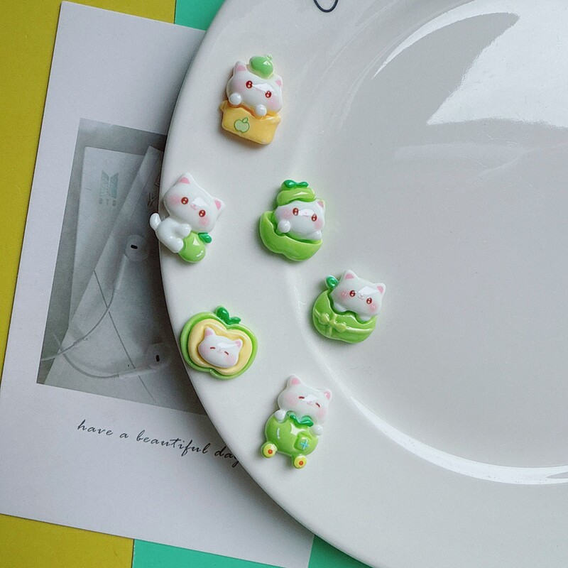 New green apple cat DIY accessories, cream glue resin hair clips, fridge magnets, water cup, hole shoe material accessories wholesale New green apple cat DIY accessories, cream glue resin hair clips, fridge magnets, water cup, hole shoe material accessories wholesale