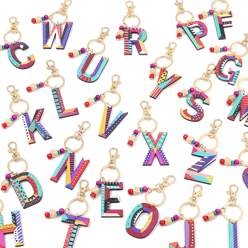 Wooden geometric keychain with letters