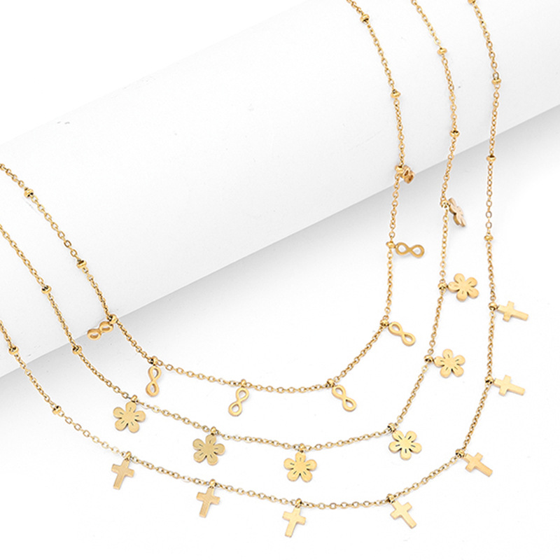Accessoires de coupe de bijoux exquis en acier inoxydable de style coréen, croix de fleur en forme de 8, collier en acier titane doré pour_voghion.com