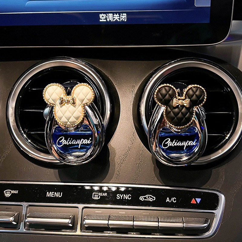 Perfumes de automóviles, salidas de aire, adornos de automóviles