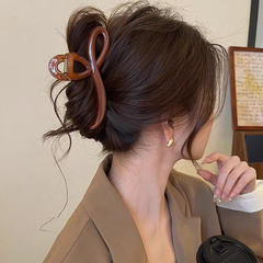 2025新型高級感美ラードは大きいサイズの女性の後頭部のサメを挟んで髪を挟みます。