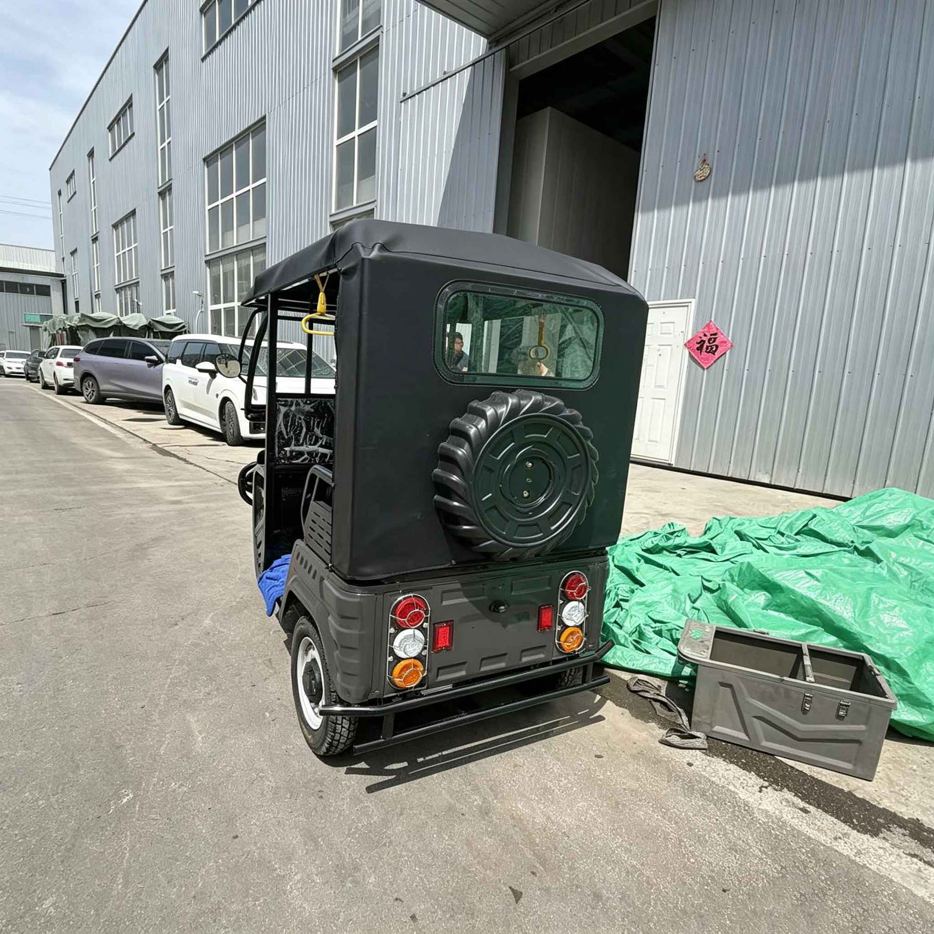 Fueled by a Powerful Engine, the Passenger-Fueled Tricycle with a Canopy Is a Cross-Border Tuktuk for Transporting Passengers and Cargo