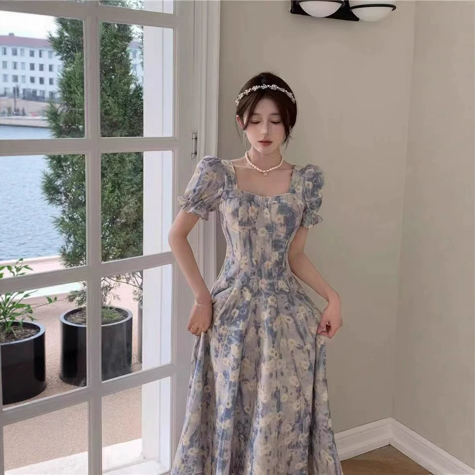 Синяя масляная живопись цветочным платьем женский 2025 новый летний квадратный воротник с пузырьками рукава талия тонкая средняя длинная юбка