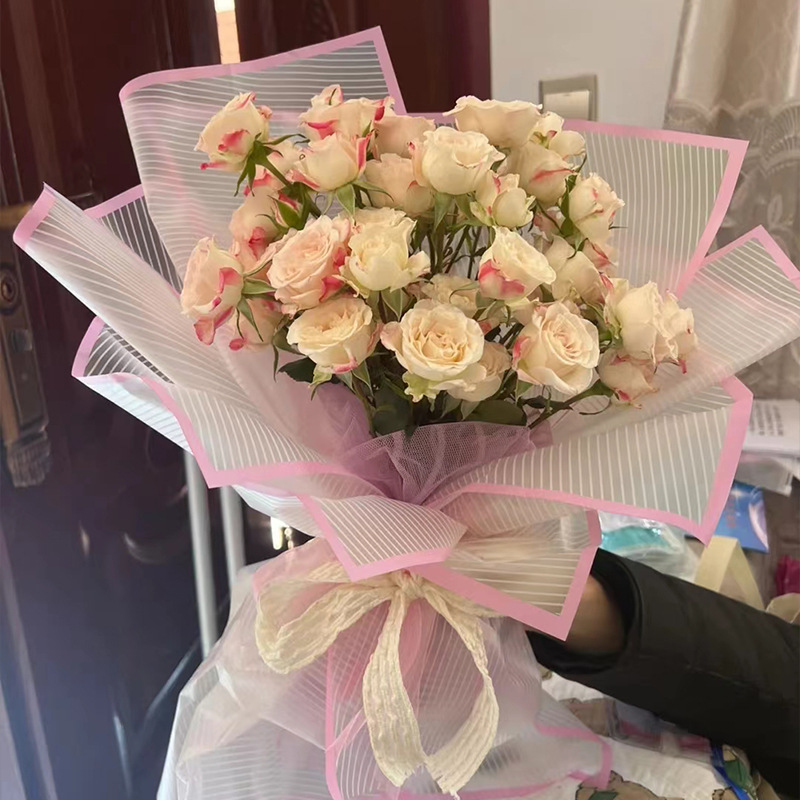 Huaxi línea de amor papel de embalaje de flores Hansu papel de niebla impermeable florista materiales de embalaje de ramo al por mayor transfronterizo