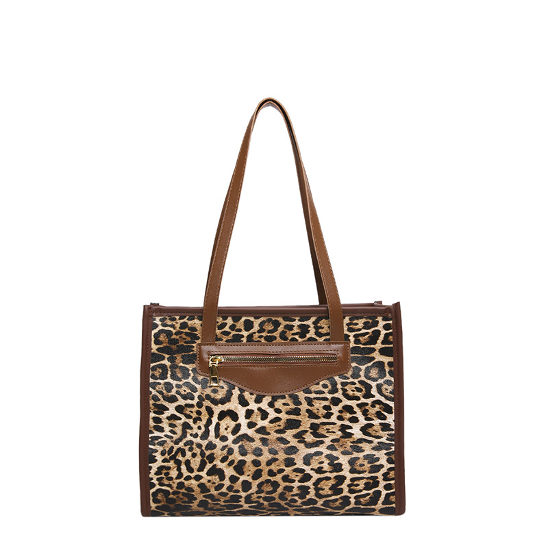 Bolso de gran capacidad de moda de leopardo para mujeres 2024 nuevo estilo de moda de viaje tote nicho diseño de hombro mochila