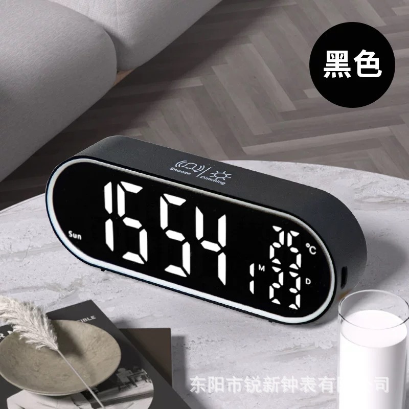 Reloj despertador electrónico ovalado de plástico, venta directa de fábrica, multifuncional, se puede usar como espejo, estilo coreano simple.