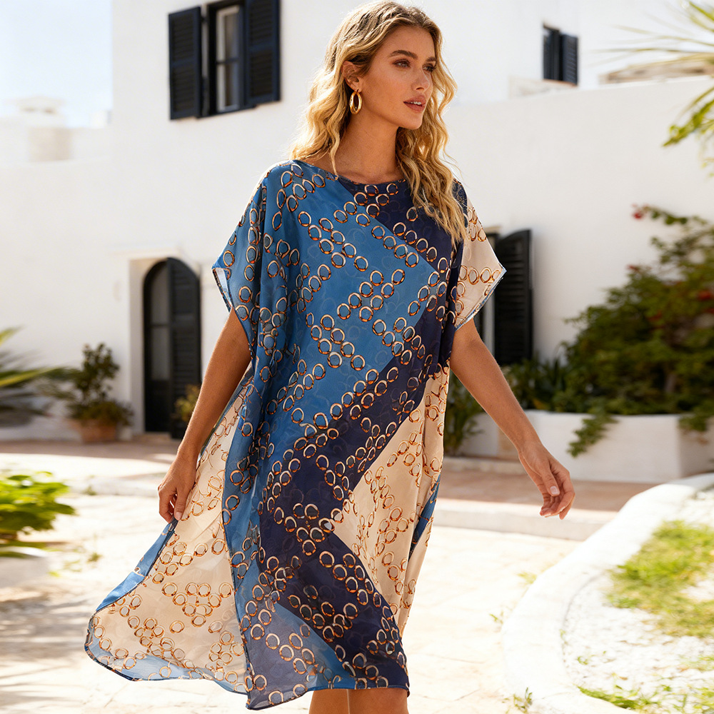 2026 explosión de ropa de moda europea y americana de playa bikini blusa elegante falda protectora solar chal flores vacaciones