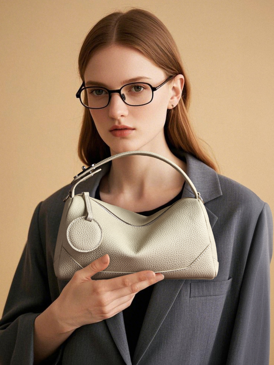 TOGOトップ層牛革女性バッグファッション真皮クロスボーダーボストンバッグ