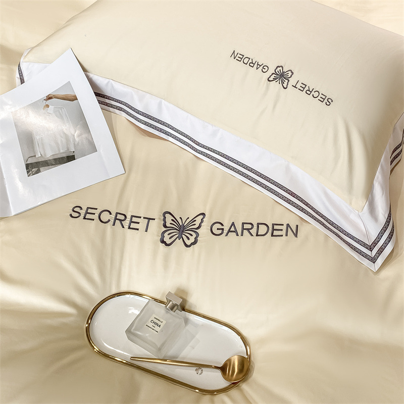 Simple ligero de lujo algodón puro cuatro piezas de sábanas de algodón ropa de cama textil doméstico cuatro estaciones tres piezas de conjunto general