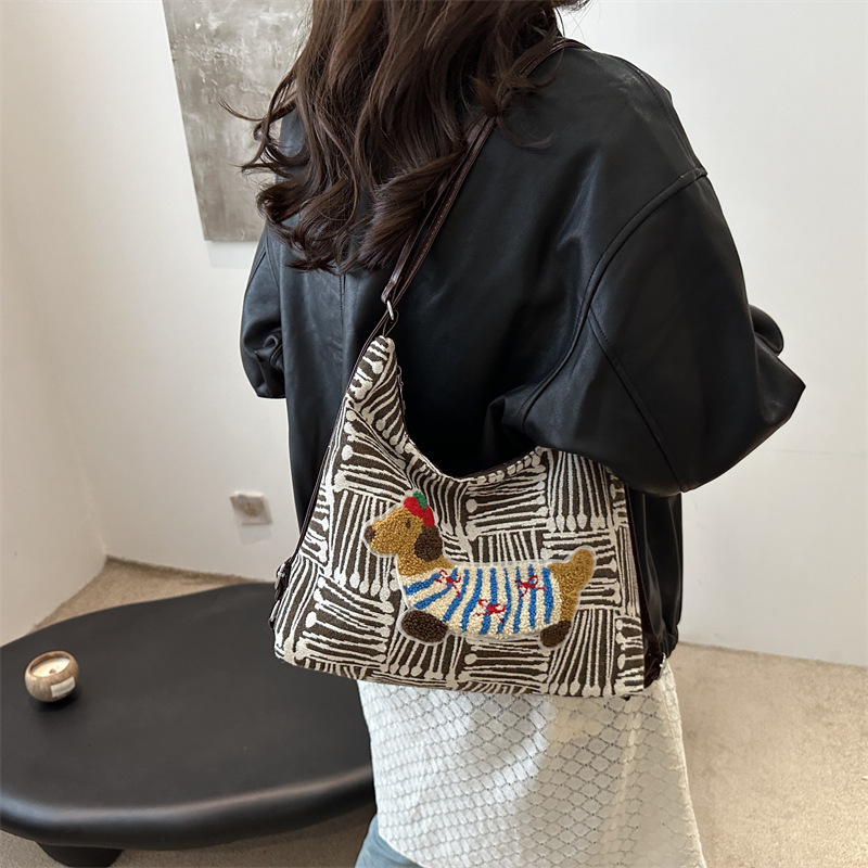 Casual bolso de gran capacidad a cuadrillas mujeres 2024 nuevo estilo popular crayón perro mochila de hombro bolso de hombro