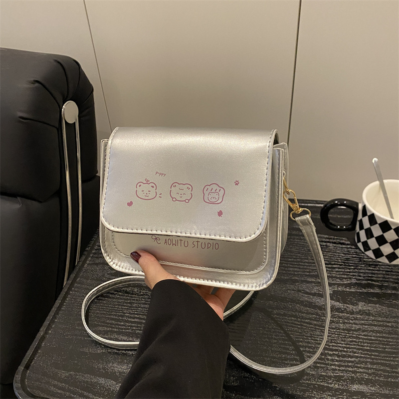 Bolso de mujer de color contrastante 2025 nuevo estilo de estilo de impresión de moda extranjera, bolso de hombro simple, bolso de mochila dulce