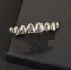 Gun black irregular copper cast upper teeth with eight teeth