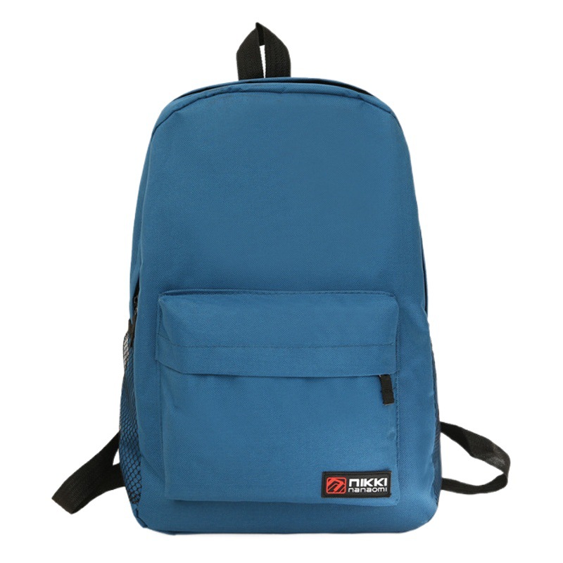 Factory spot wholesale solid color backpack large capacity primary and secondary school students schoolbag training institutions printed logo